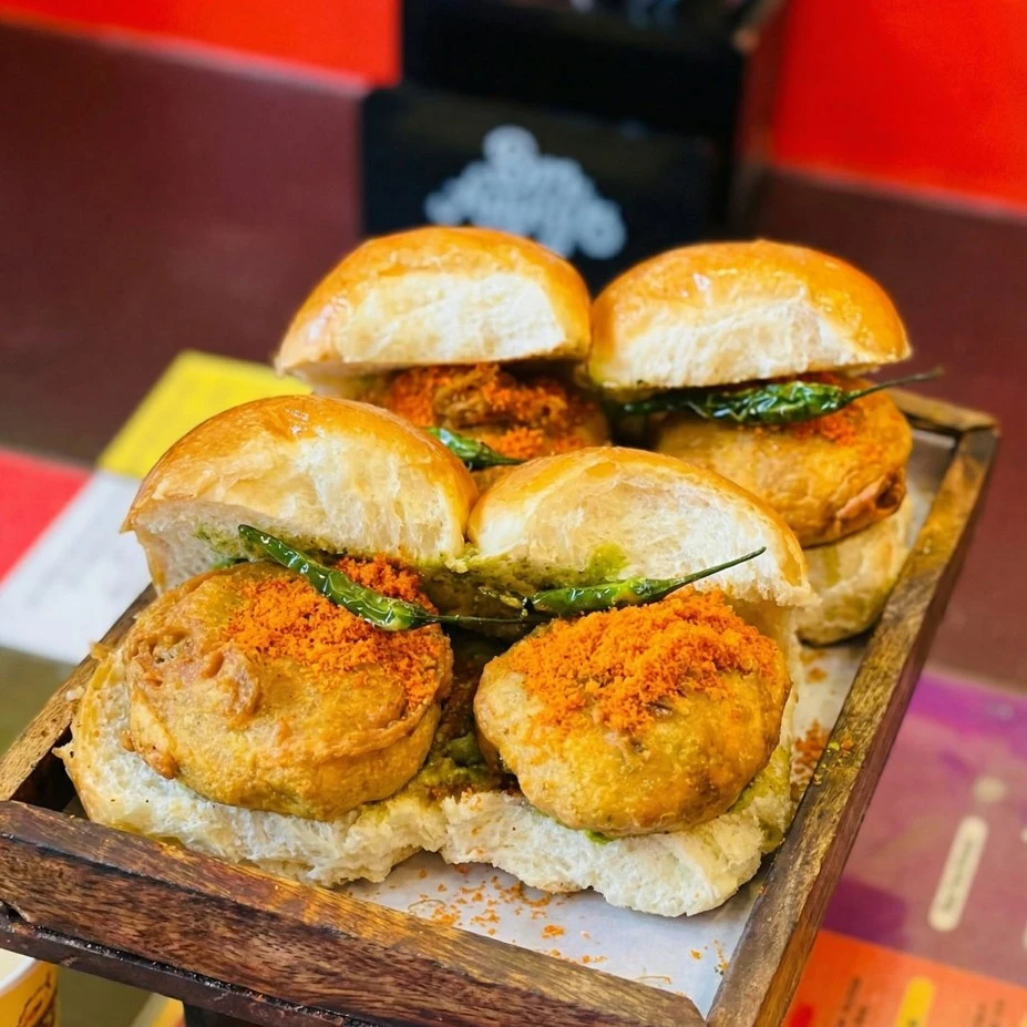 Authentic Vada Pav with spiced potato patty and chutneys at Vivaan's Yummies Calgary NE